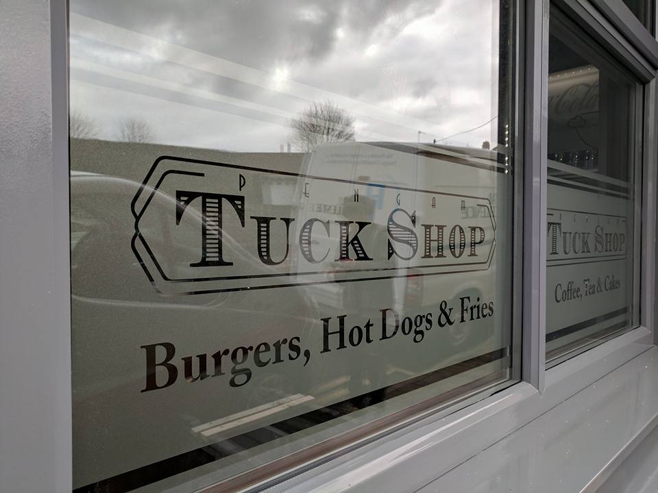 17352332_1319041954810014_4076909199933174321_n Tuck shop window signs
